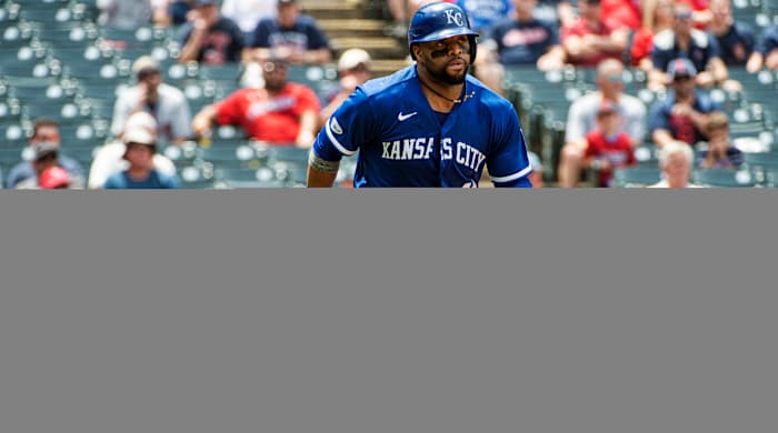 Kansas City Royals’ Carlos Santana heads to first base after hitting a single off Cleveland Guardians starting pitcher Konnor Pilkington during the fourth inning of a baseball game in Cleveland, Tuesday, June 1, 2022.
